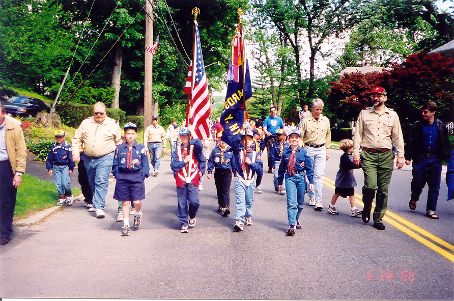 Jonah in Cub Scouts (May 2000) ... he's the smiley kid to the right of the flags